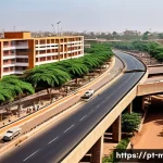 Home 19 말리와 중국의 경제 협력 - A bustling urban scene in Bamako, Mali, showcasing modern infrastructure development with newly cons...